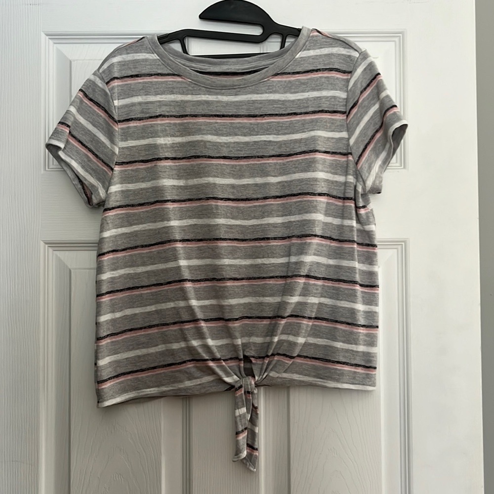 Cute striped front tie short sleeve top. Woman’s size M